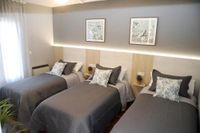 Grupo Arcanos Pensión Atenea & Via Romana